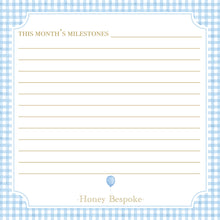 Load image into Gallery viewer, The image is a blank milestone sheet with a blue and white checkered border, and it is titled "THIS MONTH'S MILESTONES" at the top.