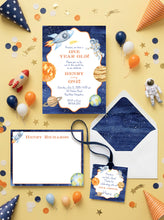 Load image into Gallery viewer, a birthday party invitation for a one-year-old named Henry, featuring a space theme with a rocket ship, planets, and stars. The invitation is surrounded by various party decorations, including balloons, stars, and a rocket ship.