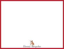 Load image into Gallery viewer, a brown and white bulldog sitting in the center of a red frame.