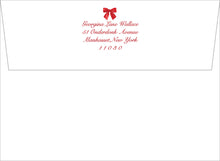 Load image into Gallery viewer, The image is a white envelope with a red bow on the top left corner. The address is "Georgina Lane Wallace 51 Underdornk Avenue Manhasset, New York 110.80".
