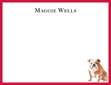 Load image into Gallery viewer, a brown and white bulldog sitting on a white background with a red border.
