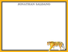 Load image into Gallery viewer, a tiger walking in front of a yellow border.
