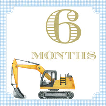 Load image into Gallery viewer, A yellow construction vehicle with a bucket on the front, accompanied by the text "6 MONTHS" in a decorative font.
