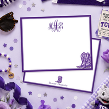 Load image into Gallery viewer, Purple and white TCU themed stationery set featuring a monogram notepad and matching envelope, styled in a flat lay with purple pom-poms, tulips, sunglasses, a beaded bracelet, a stuffed TCU mascot, and a football on a light lavender background.
